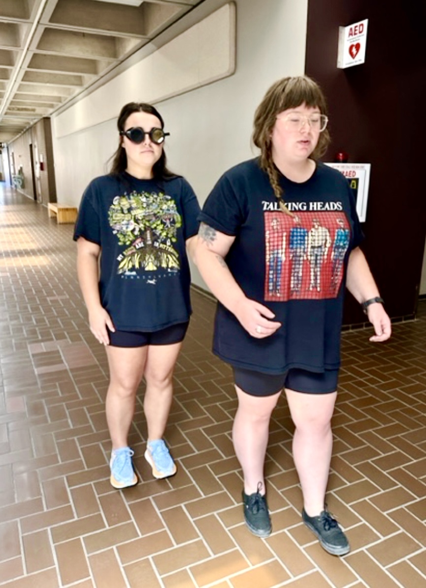 Students learning human guide with LVSK goggles